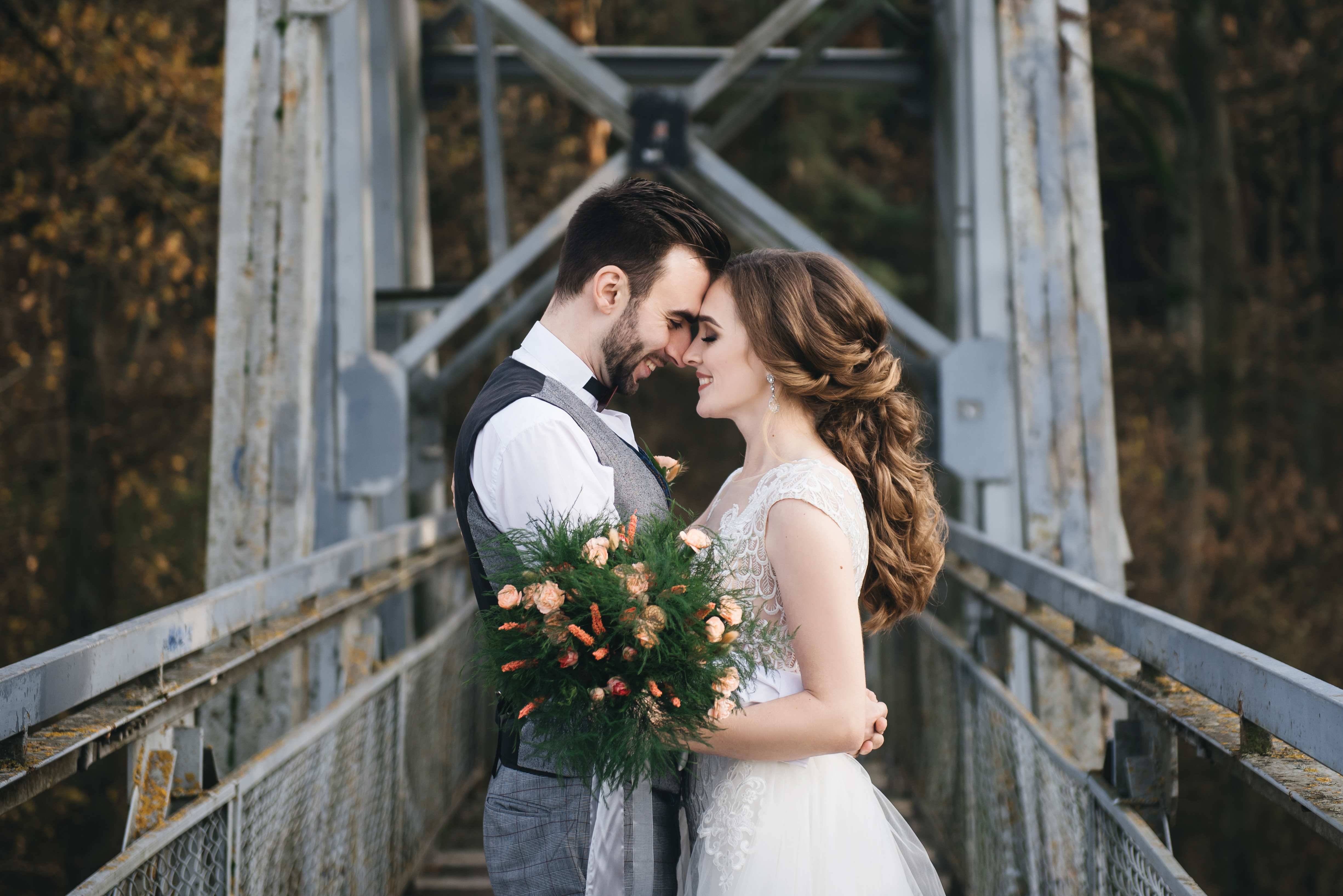 Wedding couple — groom in grey waistcoat suit