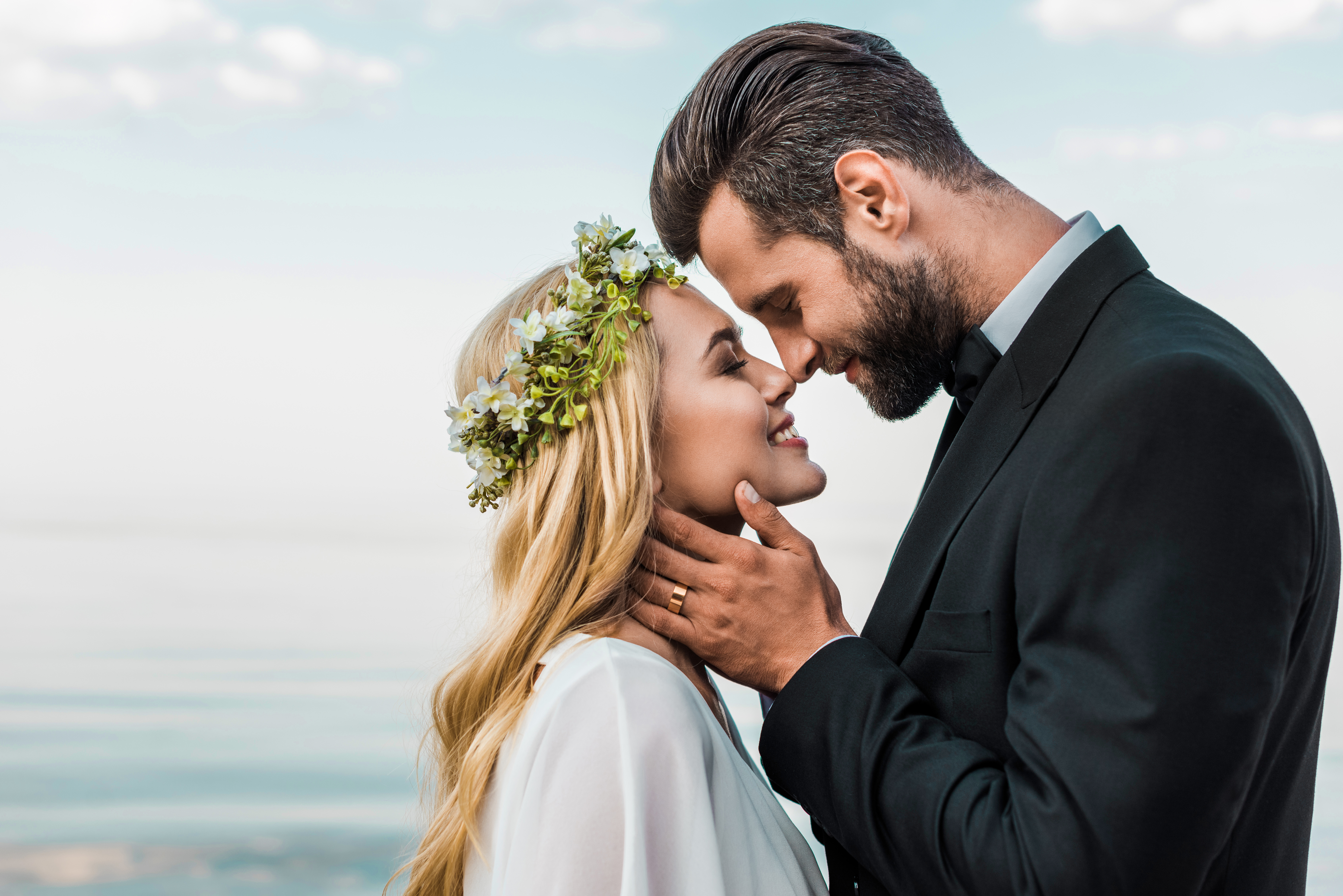 Groom in tailored black suit